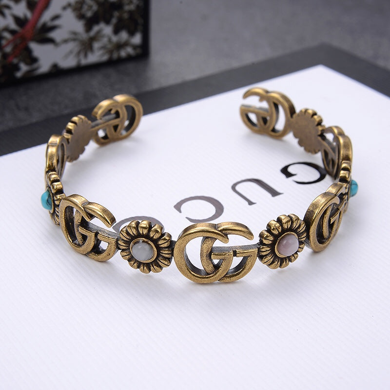 Klassisches Doppel-G-Sonnenblumen-Löwenkopf-Charm-Armband